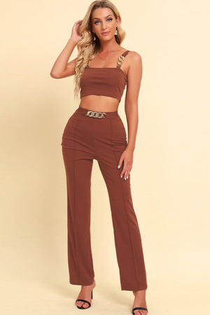 Front view highlighting outfit fit and style