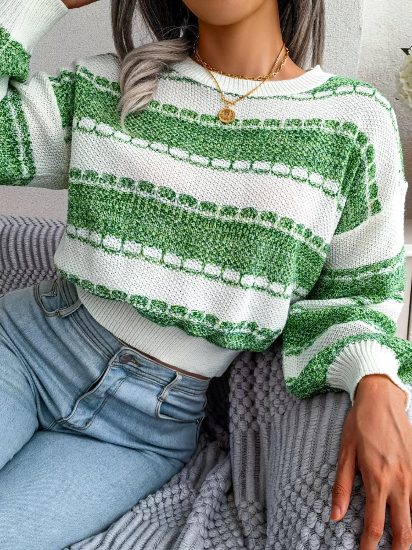 Front view of color block round neck cropped sweater