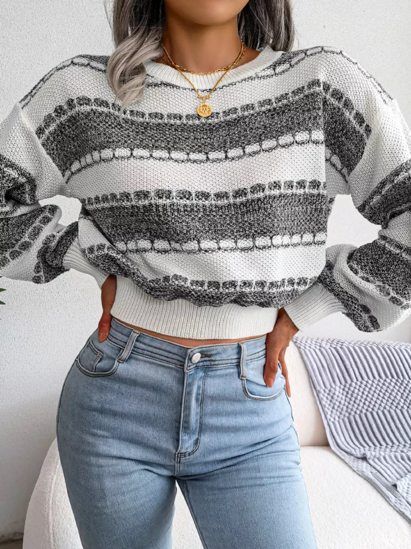 Layered outfit with cropped sweater
