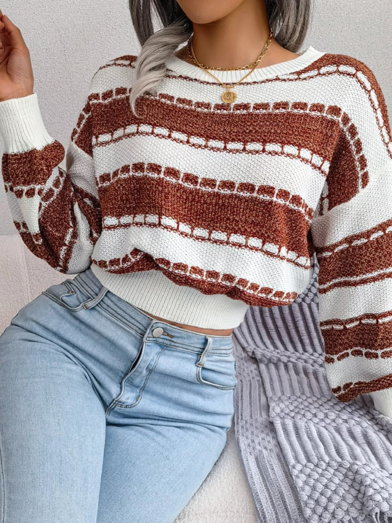 Side view of cropped sweater showing fit