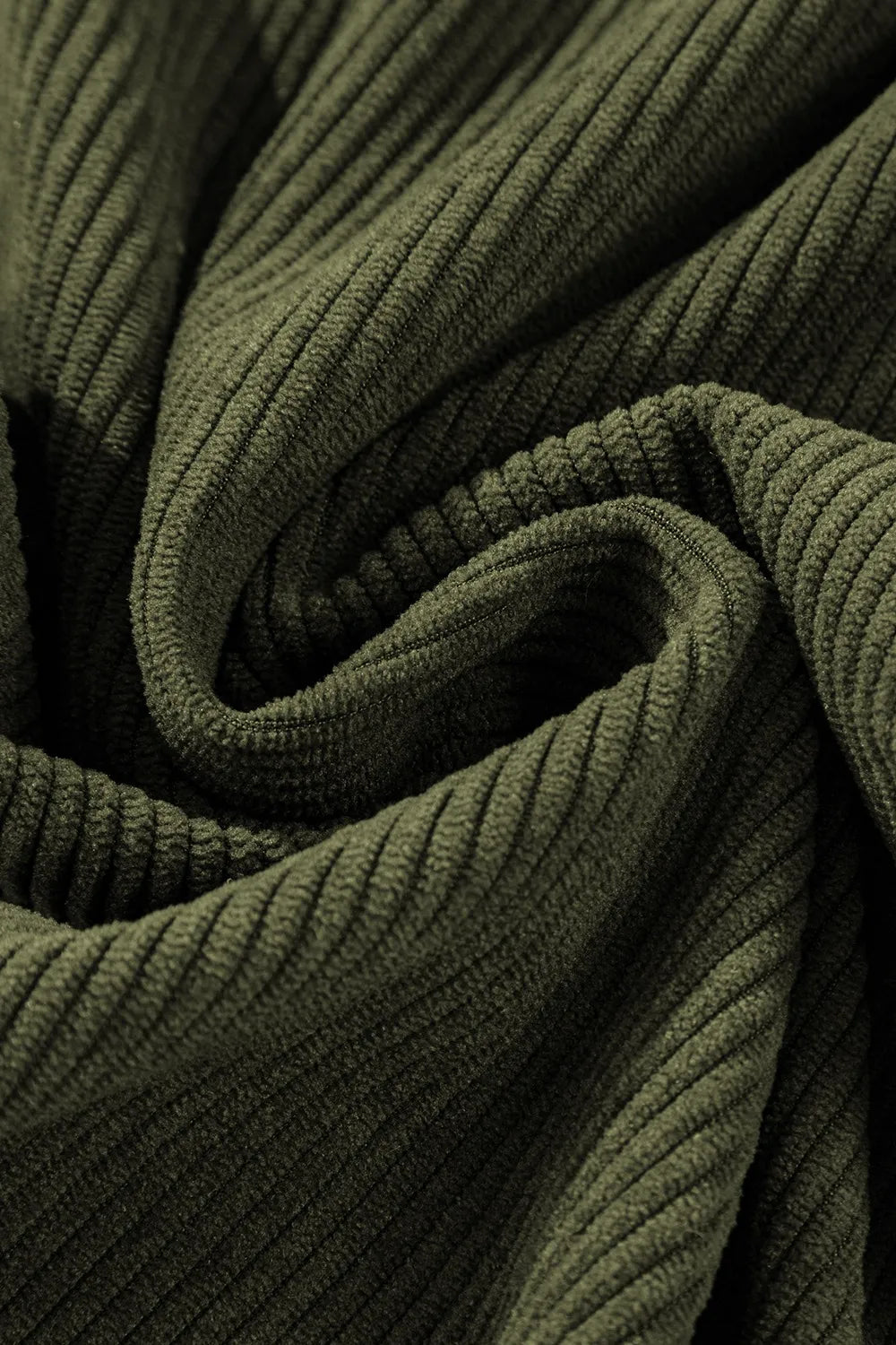 Macro view highlighting corduroy texture and material quality