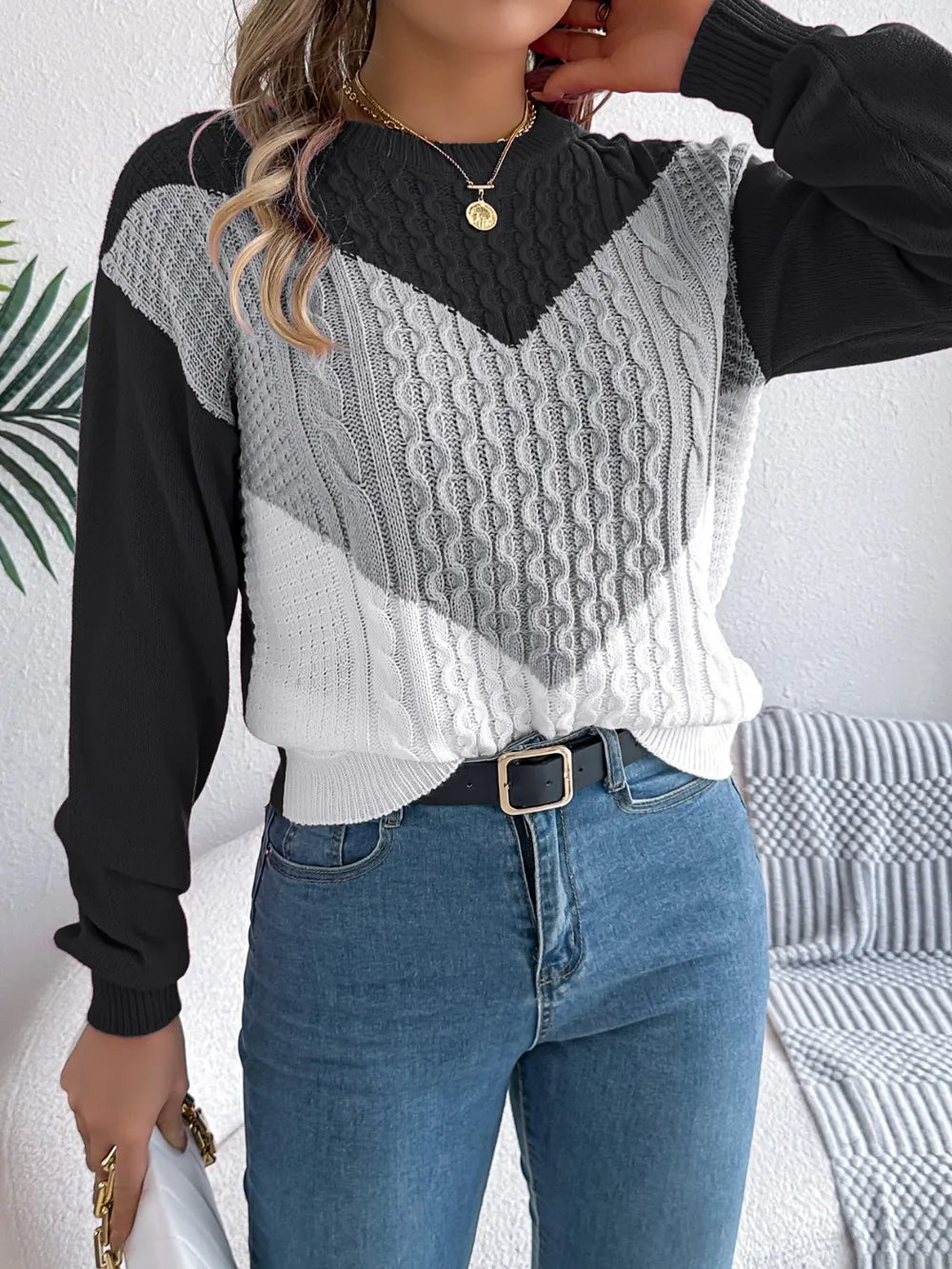 Model wearing sweater, front view