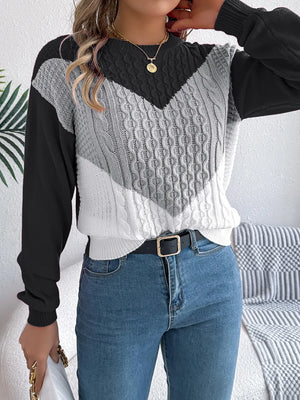 Model wearing sweater, front view