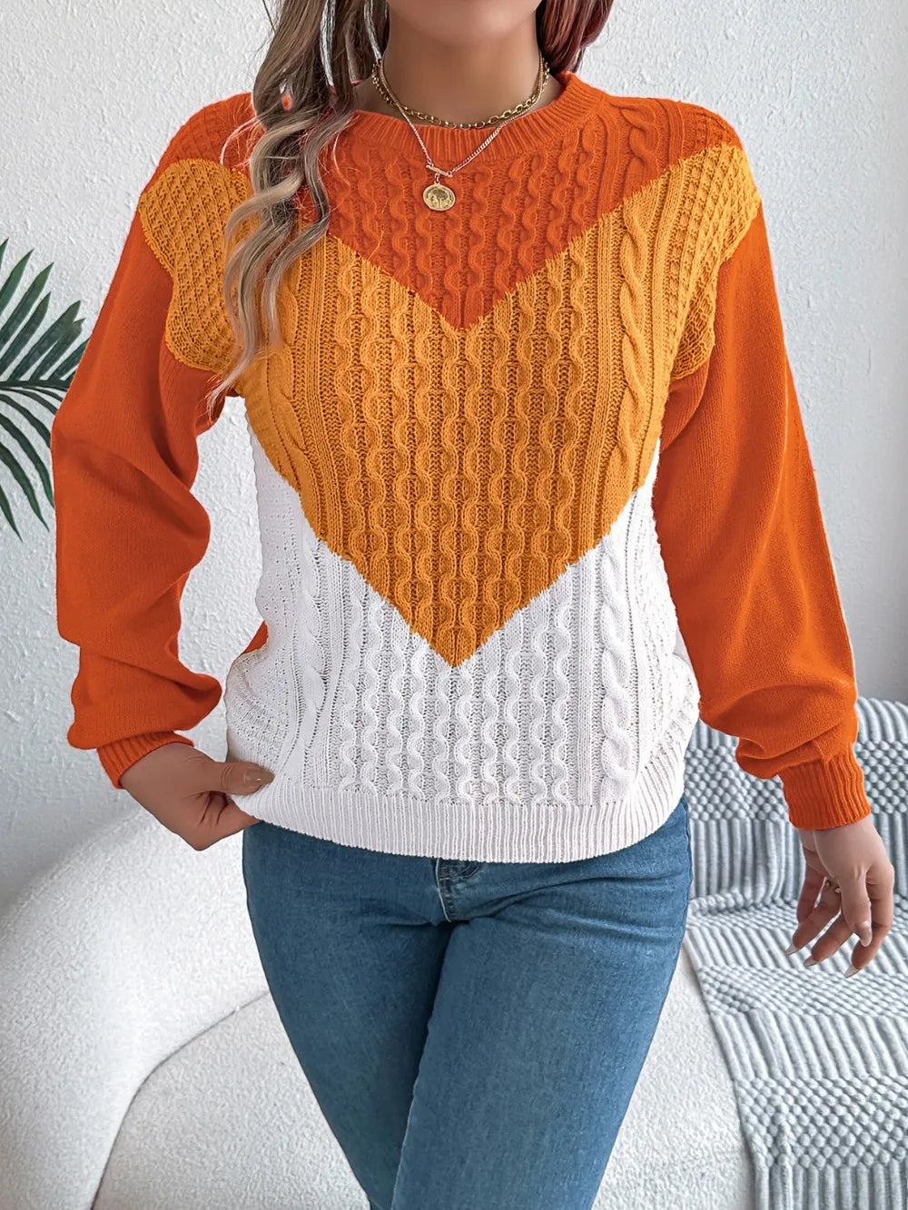 Front angle showing sweater drape on model