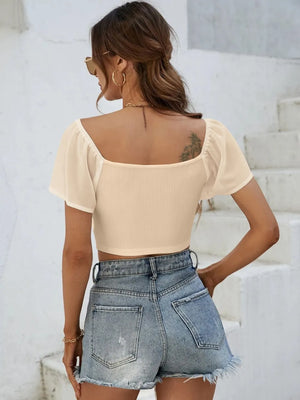 Back view of short sleeve crop top with drawstring waist