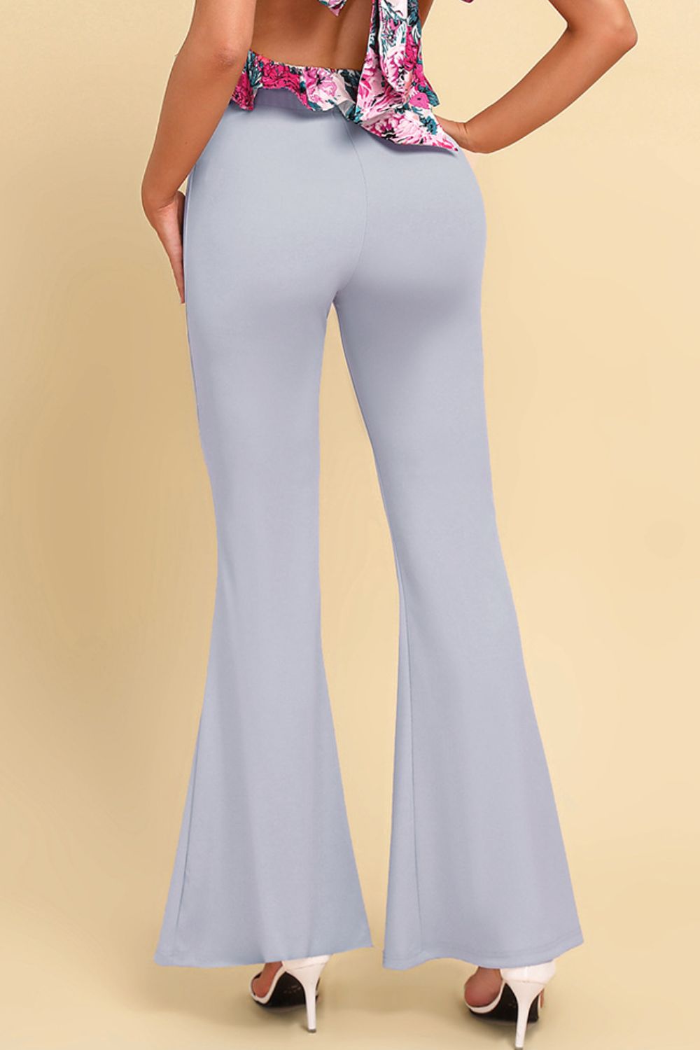 Pull on flared pants with clean back fit and flared leg cut – back view