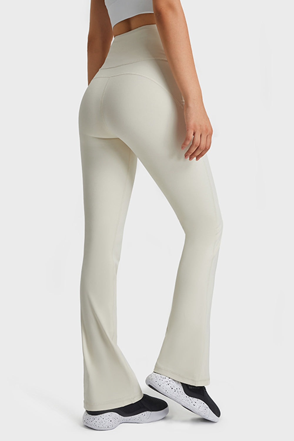 Side showing the flare from knee to ankle and soft stretch of the material
