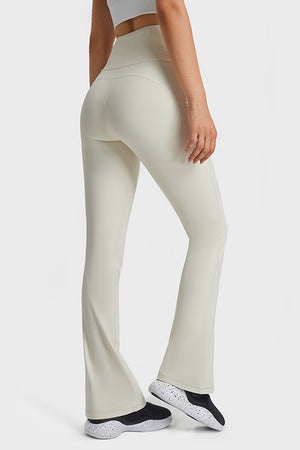 Side showing the flare from knee to ankle and soft stretch of the material