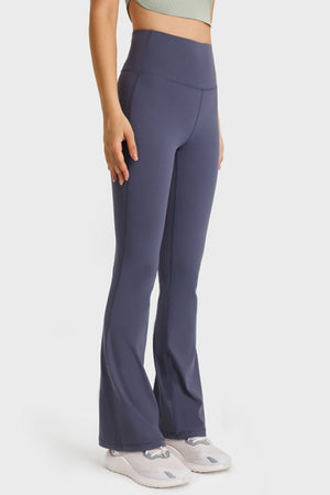 Side-back view showing how the flared legs flow with movement and fit of the waistband