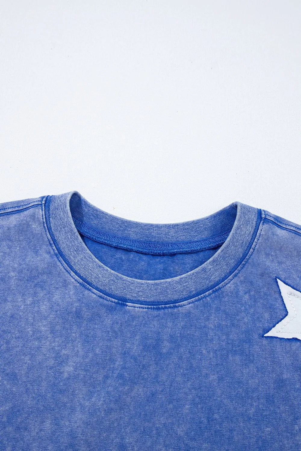 Full view of acid wash star patched top and pants