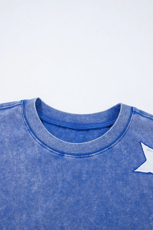 Full view of acid wash star patched top and pants