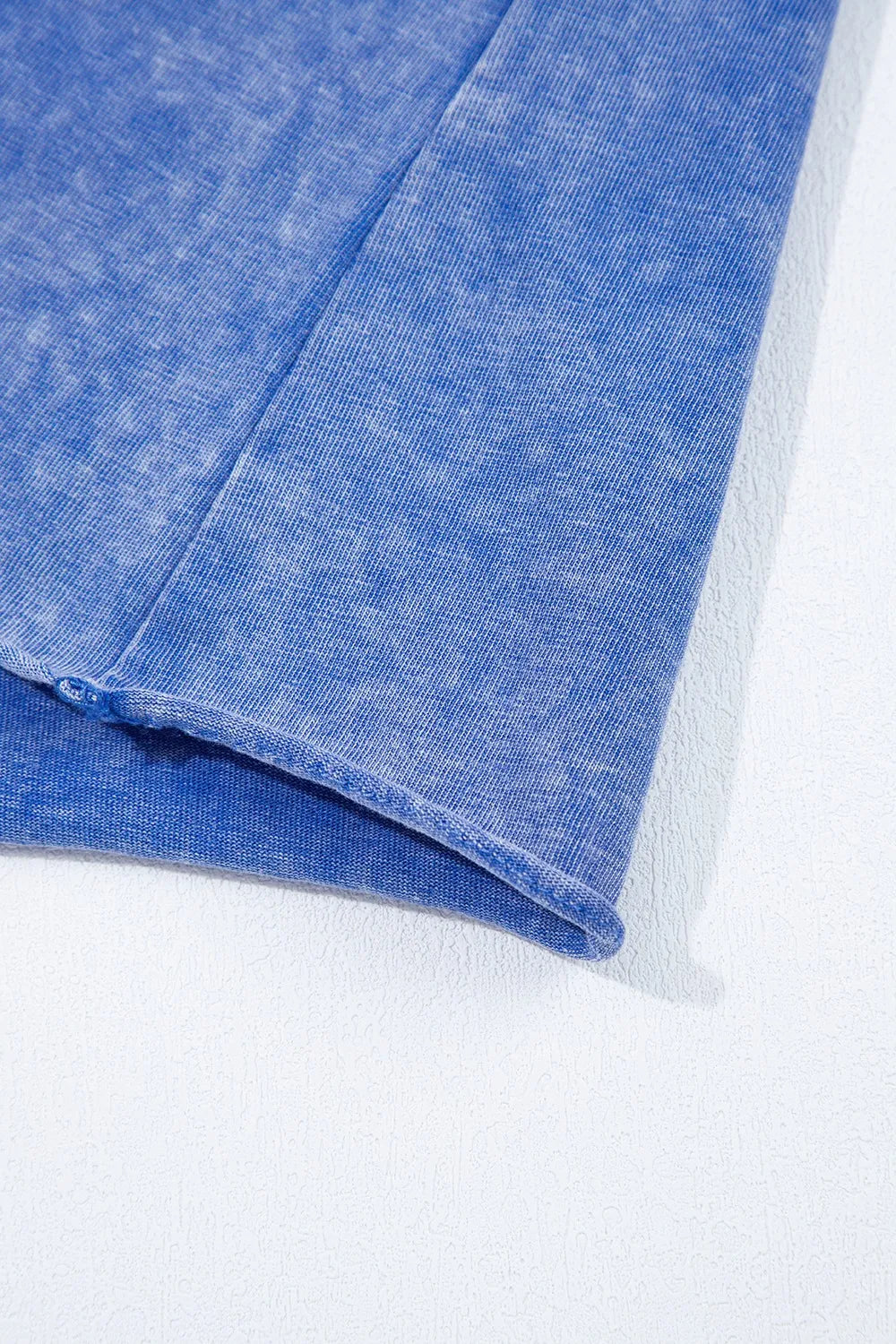 Acid wash top and pants set shown flat