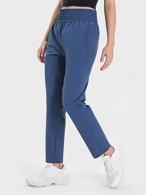 Side view of Millennia high waist active pants with pockets