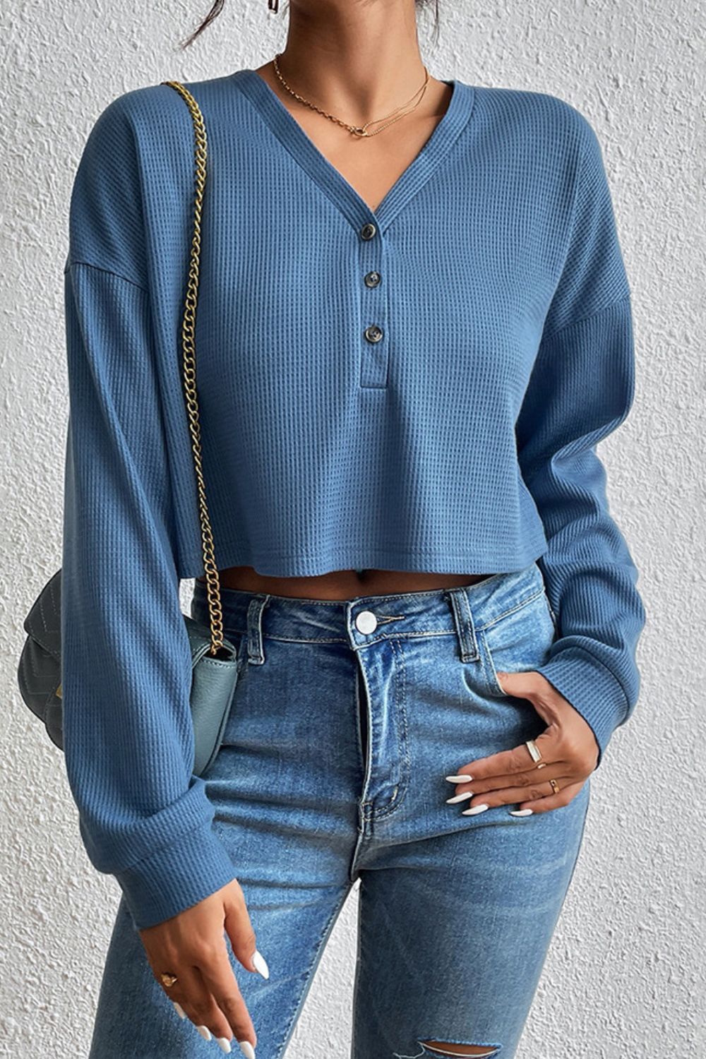 Front view of Ivy Lane cropped V-neck buttoned blouse