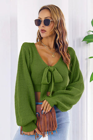 Front showcase of bow V-neck long sleeve sweater