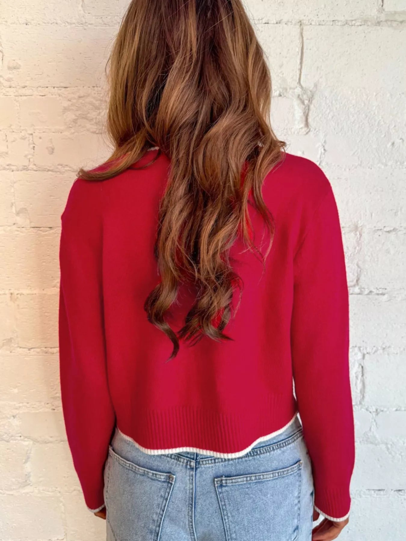 Back view of contrast trim holiday cropped sweater