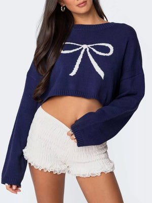 Front view of bow round neck cropped sweater