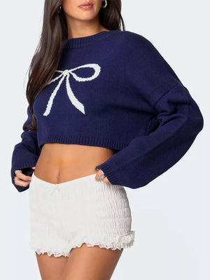 Side view of bow round neck cropped sweater
