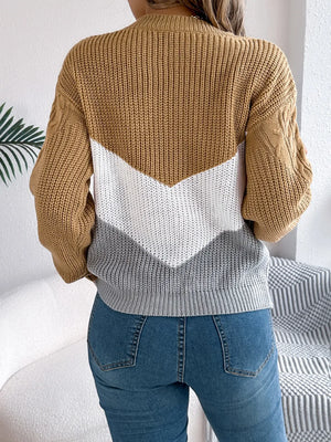 Cable knit color block sweater back view showing design details