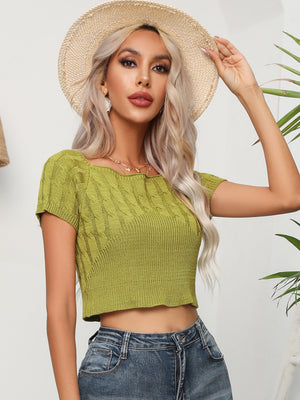 Front look of cable-knit round neck short sleeve knit top