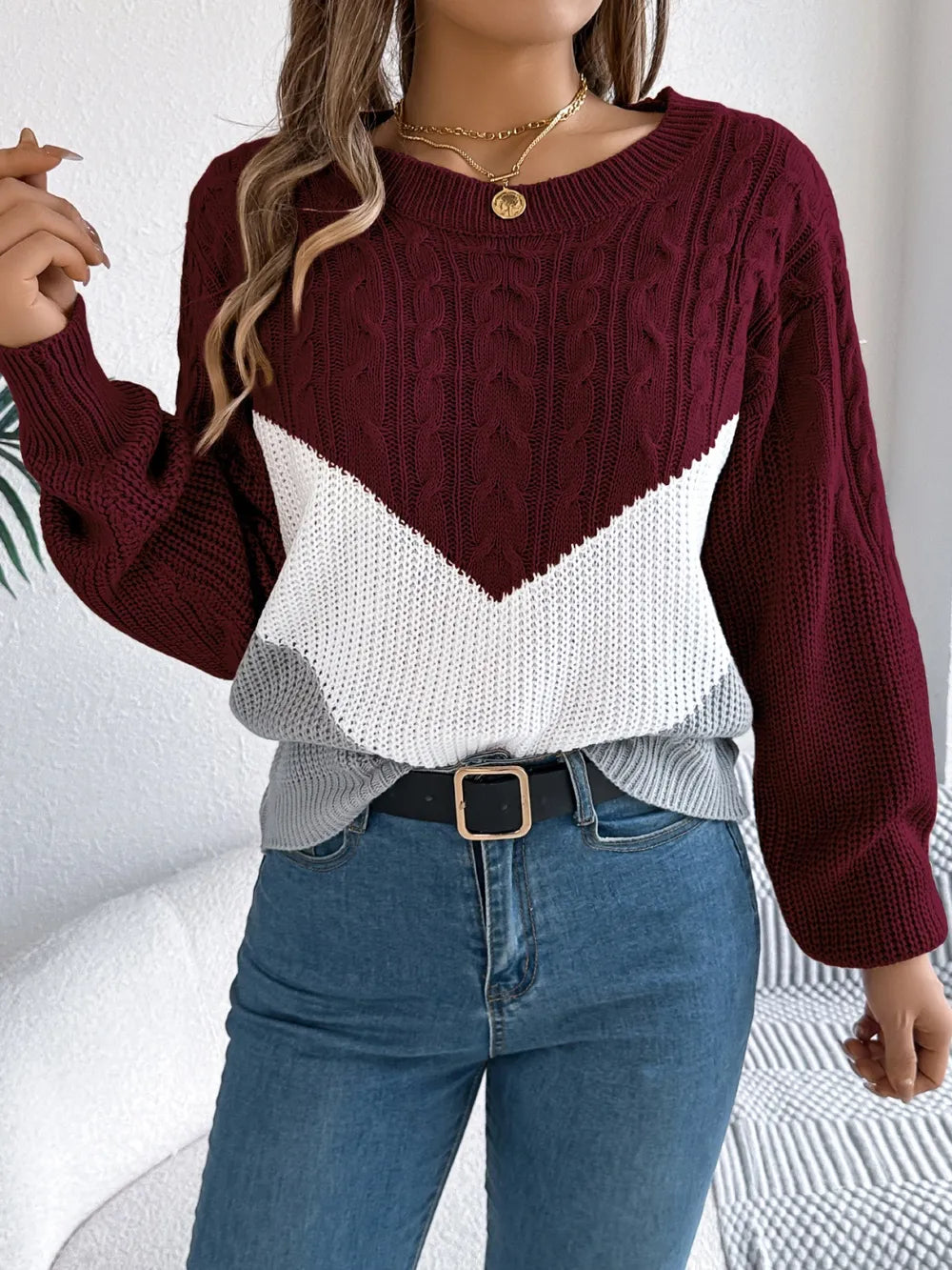 Cable knit sweater front view modern color block pattern