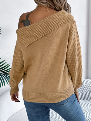 Back view of cable knit one shoulder sweater soft textured knit pattern