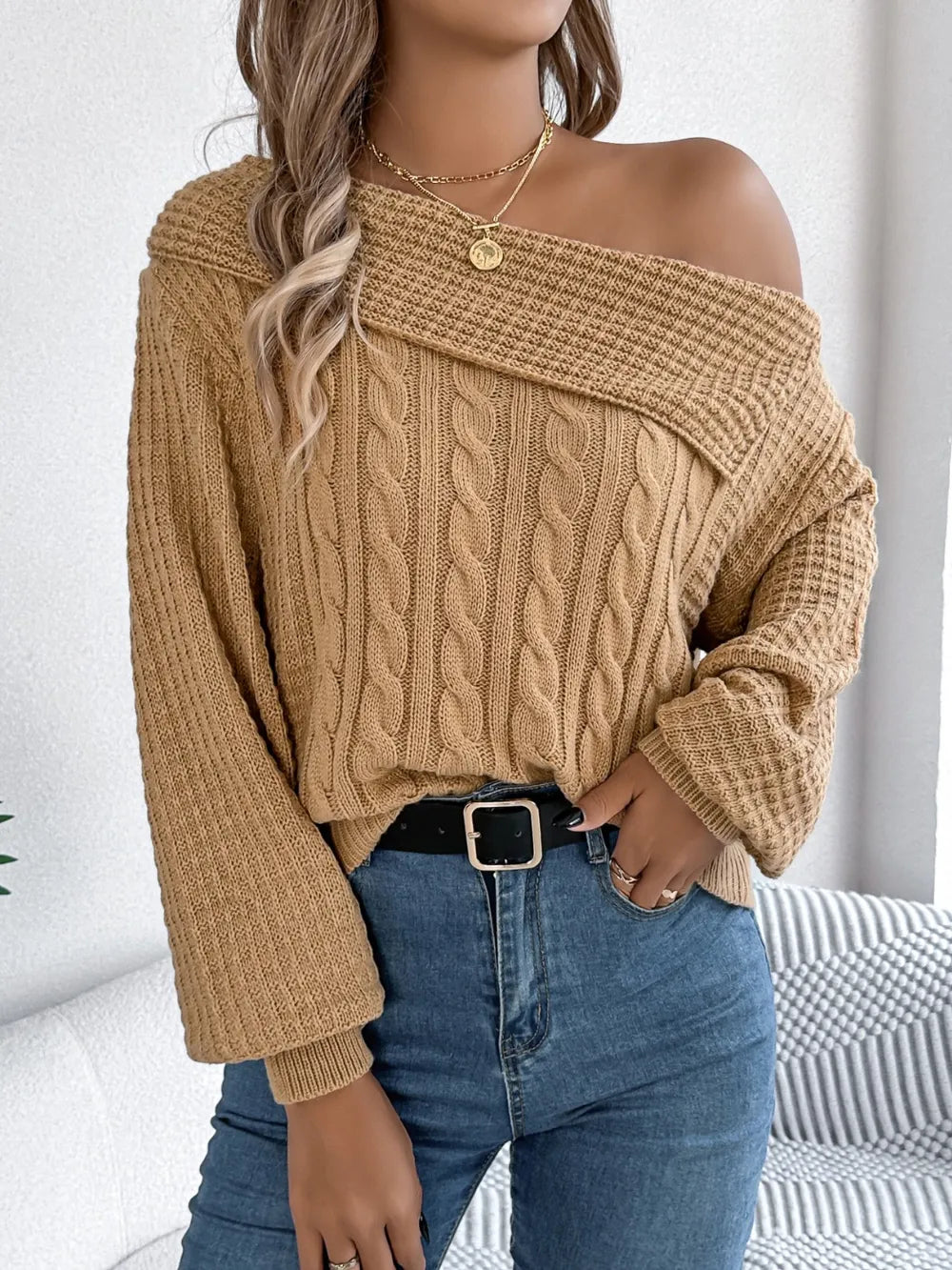 Stylish asymmetrical cable knit sweater front view casual chic look