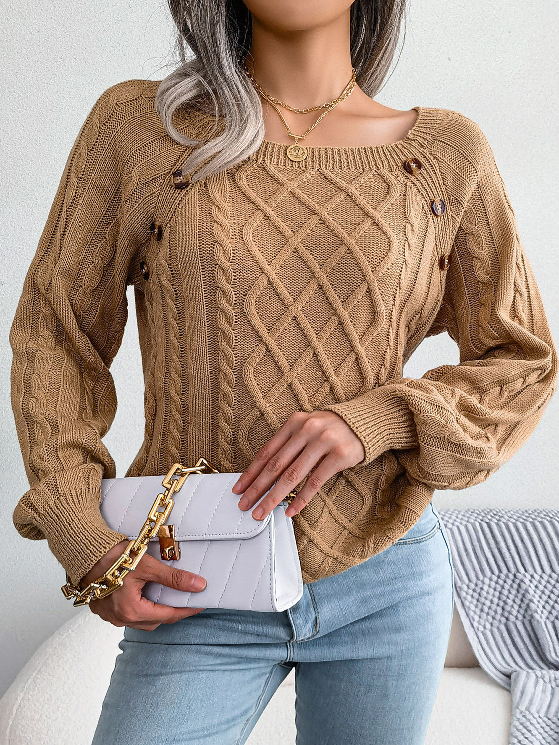 cozy cable knit sweater with decorative buttons front design