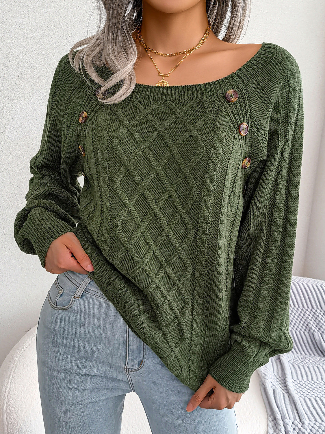 warm cable knit sweater front side with button detail