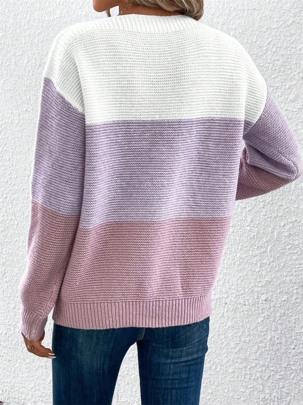 Back side of color block drop shoulder knit sweater