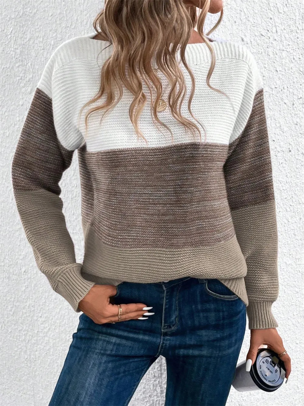 Close-up of knitted color block sweater texture