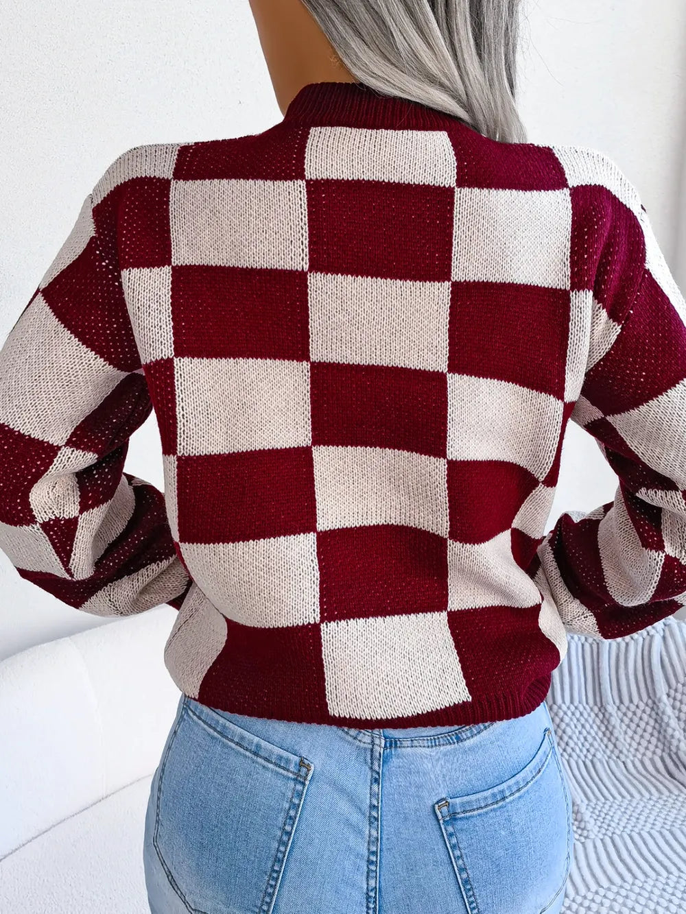 full back view of checkered long sleeve sweater