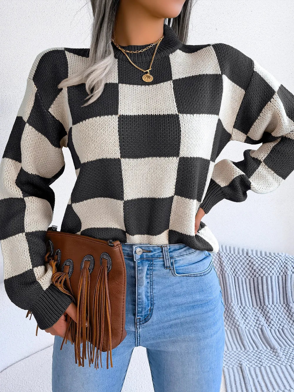 front detail of checkered pattern knit sweater