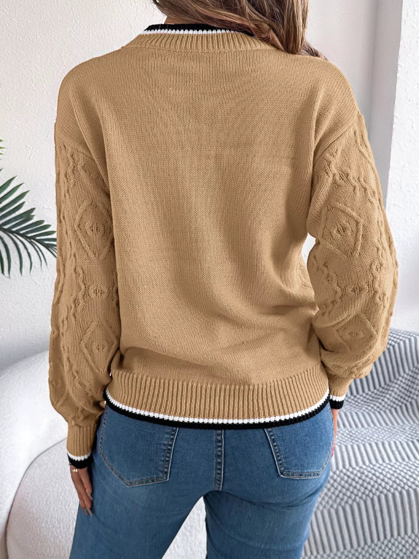 rear view of contrast trim sweater showing back pattern