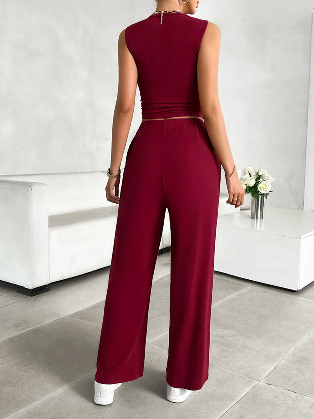 Back view of Devine mock neck sleeveless pants set