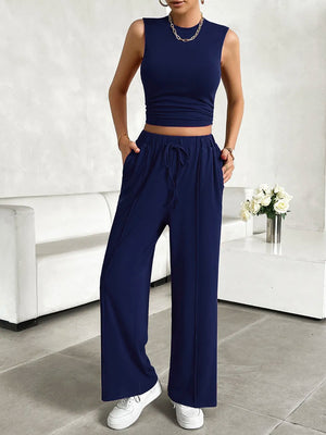 Front view of Devine sleeveless mock neck top and pants