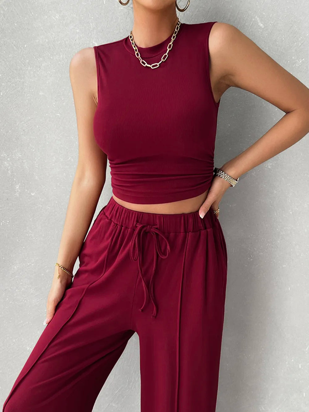 Front view of Devine sleeveless top with drawstring pants
