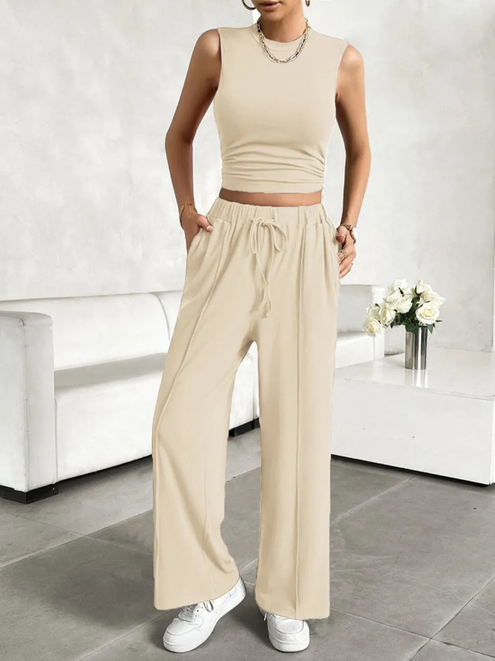 Front view of Devine sleeveless top and pants