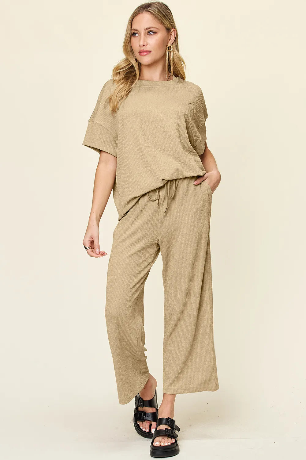 Front wearing view of Double Take textured t-shirt and pants