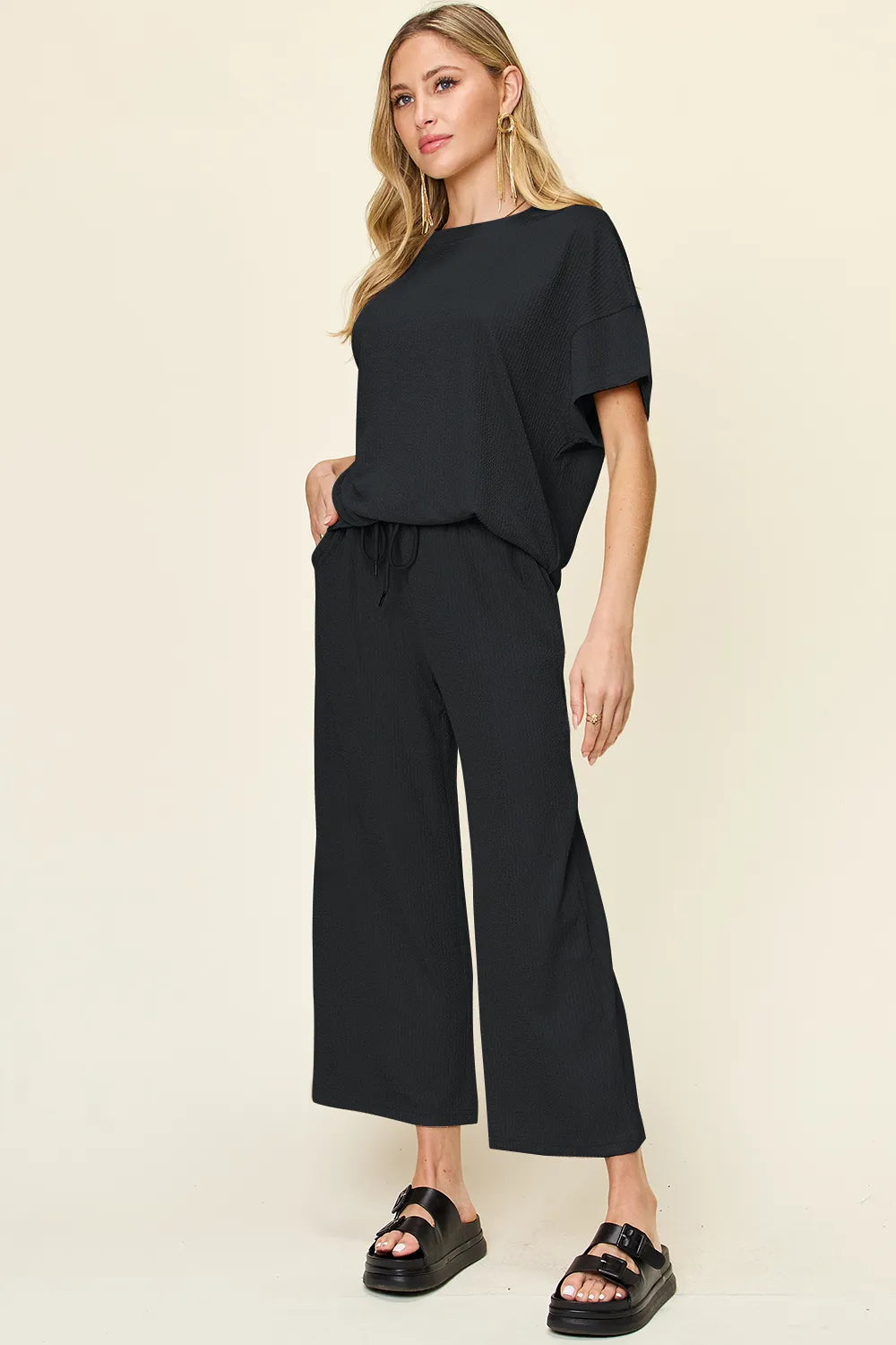 Side angle of Double Take round neck t-shirt and pants set
