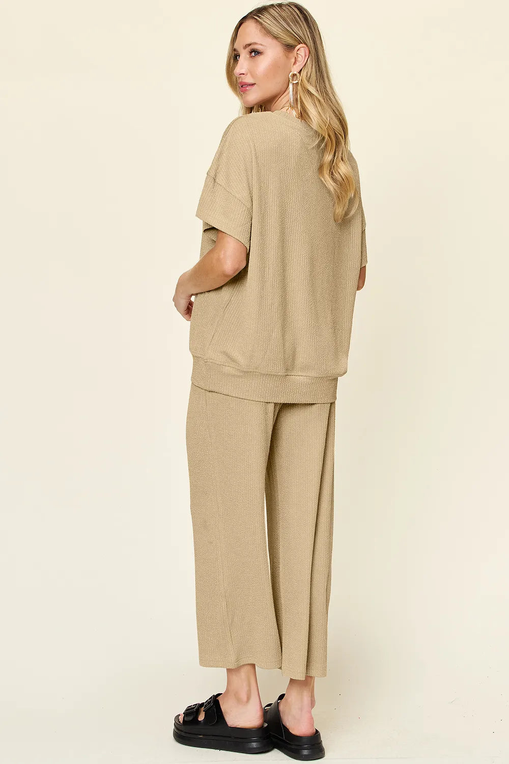 Side angle of Double Take textured t-shirt and pants