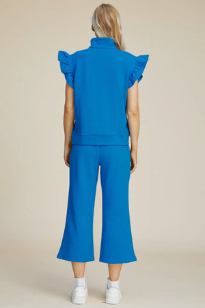 Back view of Double Take textured ruffle top and pants set