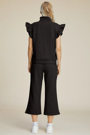 Back view of Double Take textured ruffle short sleeve top and pants