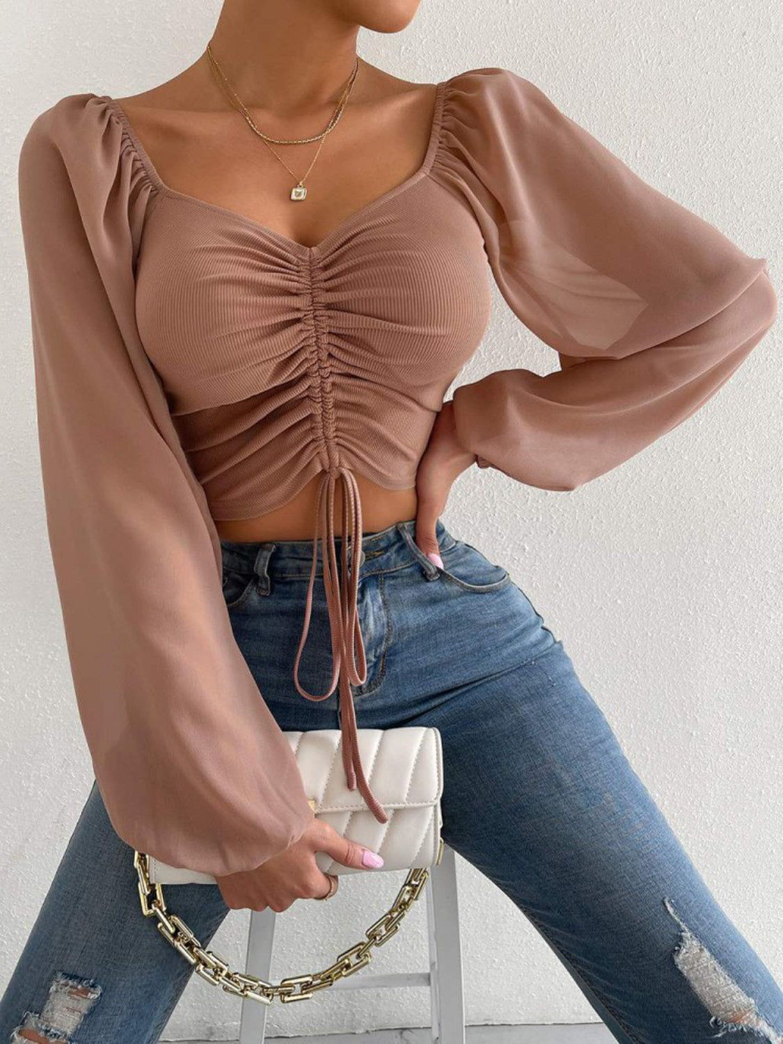 Front view showing sleeve design and neckline detail