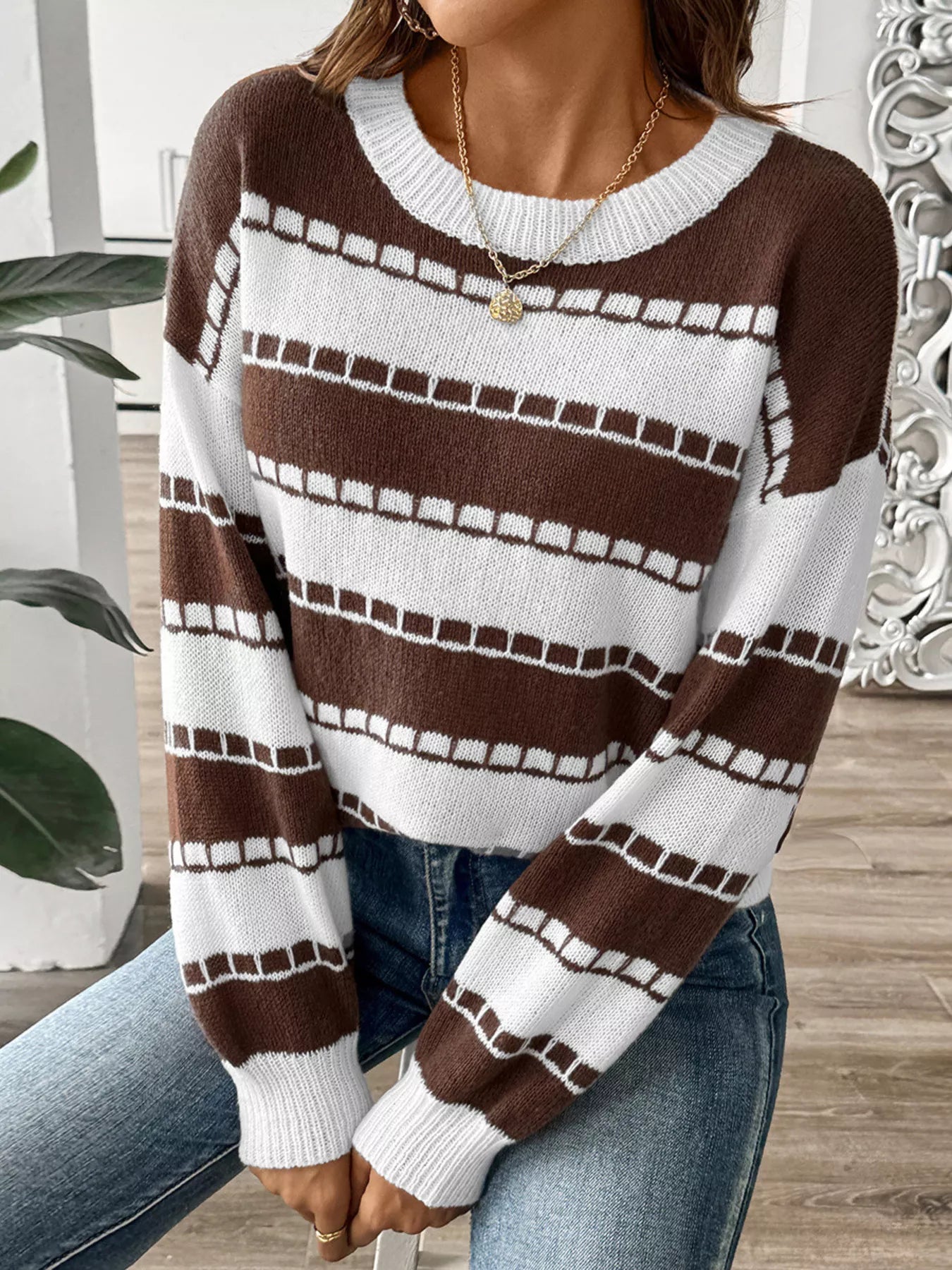 Alt: dropped shoulder striped sweater front loose fit style