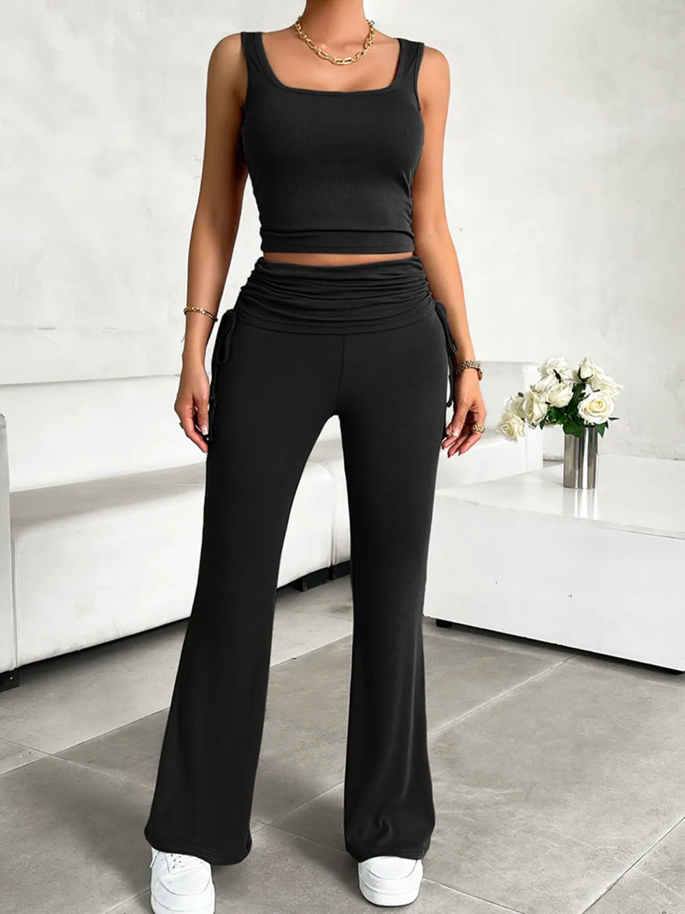 Elegant casual outfit featuring tank top and drawstring pants