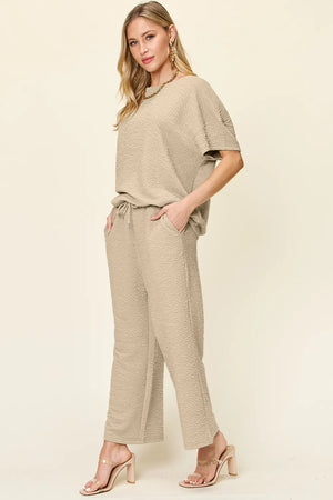 Side view of Double Take textured short sleeve pants set