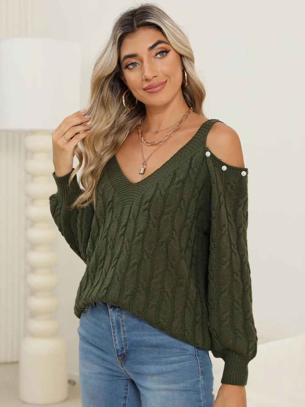 Front of Cable-Knit Cold Shoulder Sweater with cold shoulder detail