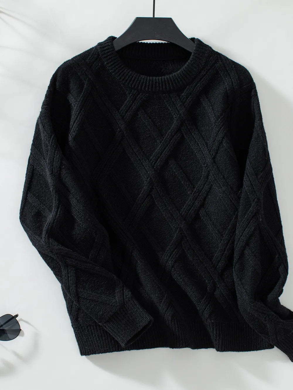 Geometric round neck sweater hanging display cozy long sleeve knitwear