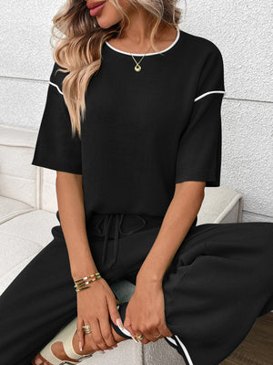 Front styling of trendy half sleeve top and pants